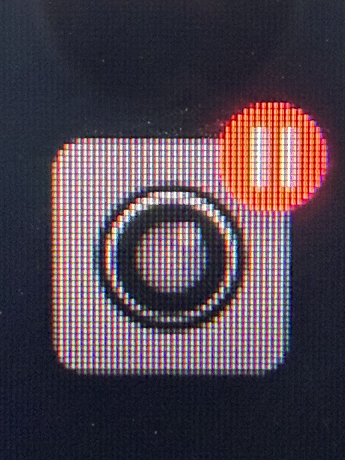 Close-up of a Tesla Sentry Mode camera icon on the car's screen, illustrating Tesla Sentry Mode evidence